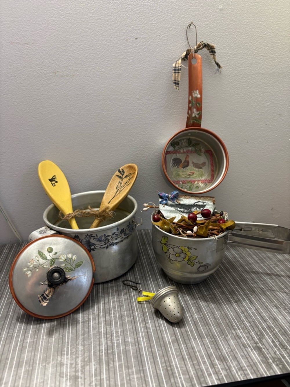 Vintage Floral Aluminum Saucepan Set with Yellow Wooden Spoons
